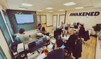 Creatives at Awakened Films discuss a corporate video production project.
