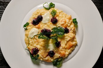 Butternut Squash Risotto — butternut squash, walnuts, crispy kale, gorgonzola, blueberry. A new addition to Fora's dinner menu, debuting March 2.